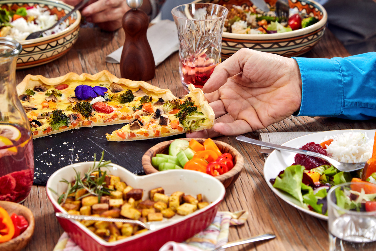 Family Eating Vegetarian Food at Home in Vienna. © Mitja  Kobal