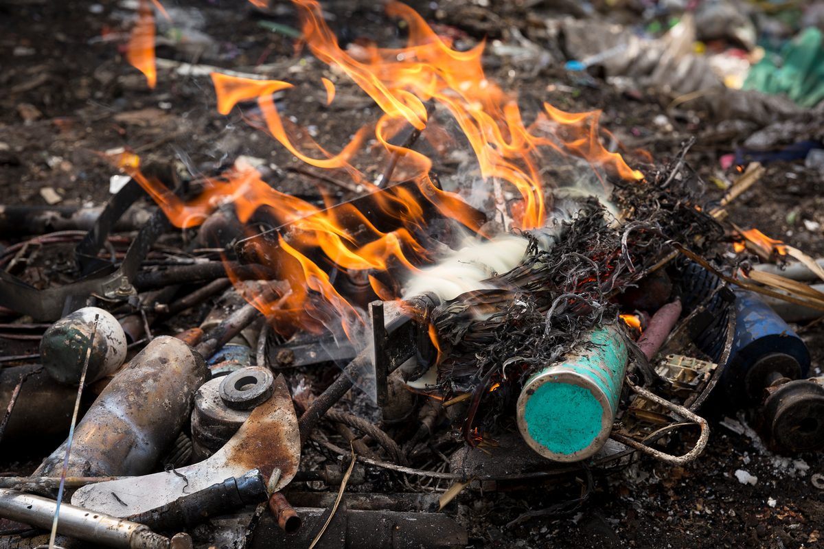 Burned Waste in Manila. © Daniel Müller / Greenpeace