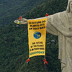 Greenpeace activists unfurl a banner from the famous Christ the Redeemer statue in Rio de Janeiro to call on governments to protect global biodiversity. Meanwhile, one of the activists tried to parachute from the statue, but had to rappel down. The action corresponds with the timing of the Convention of Biological Diversity (CBD) in Curitiba, Brazil, where representatives from 188 countries discuss the protection of biodiversity.