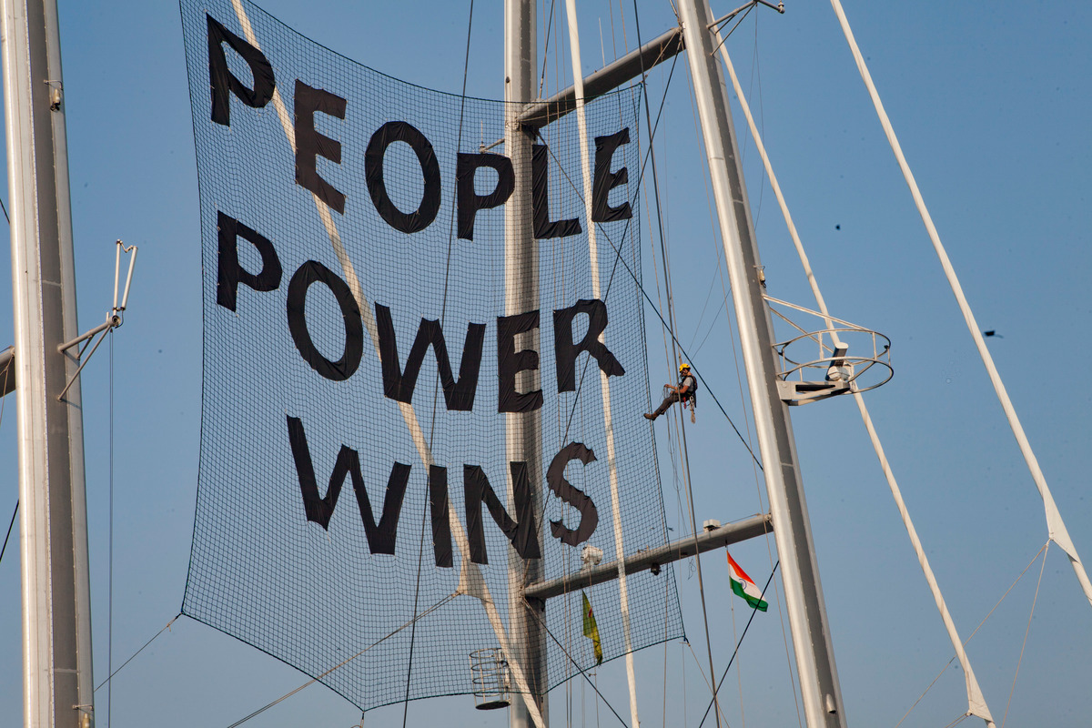 Banner on the Rainbow Warrior Docked in Mumbai. © Sajan Ponappa / Greenpeace