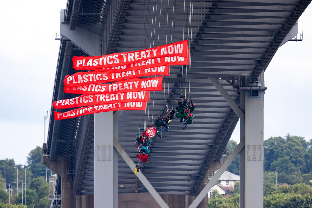 Climbers Abseil from Forth Bridge in Scotland to Block INEOS Tanker in Plastics Protest. © Luca Marino / Greenpeace