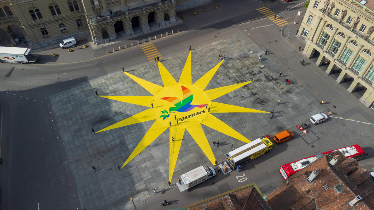 Solar for Peace Action in Switzerland. © Greenpeace