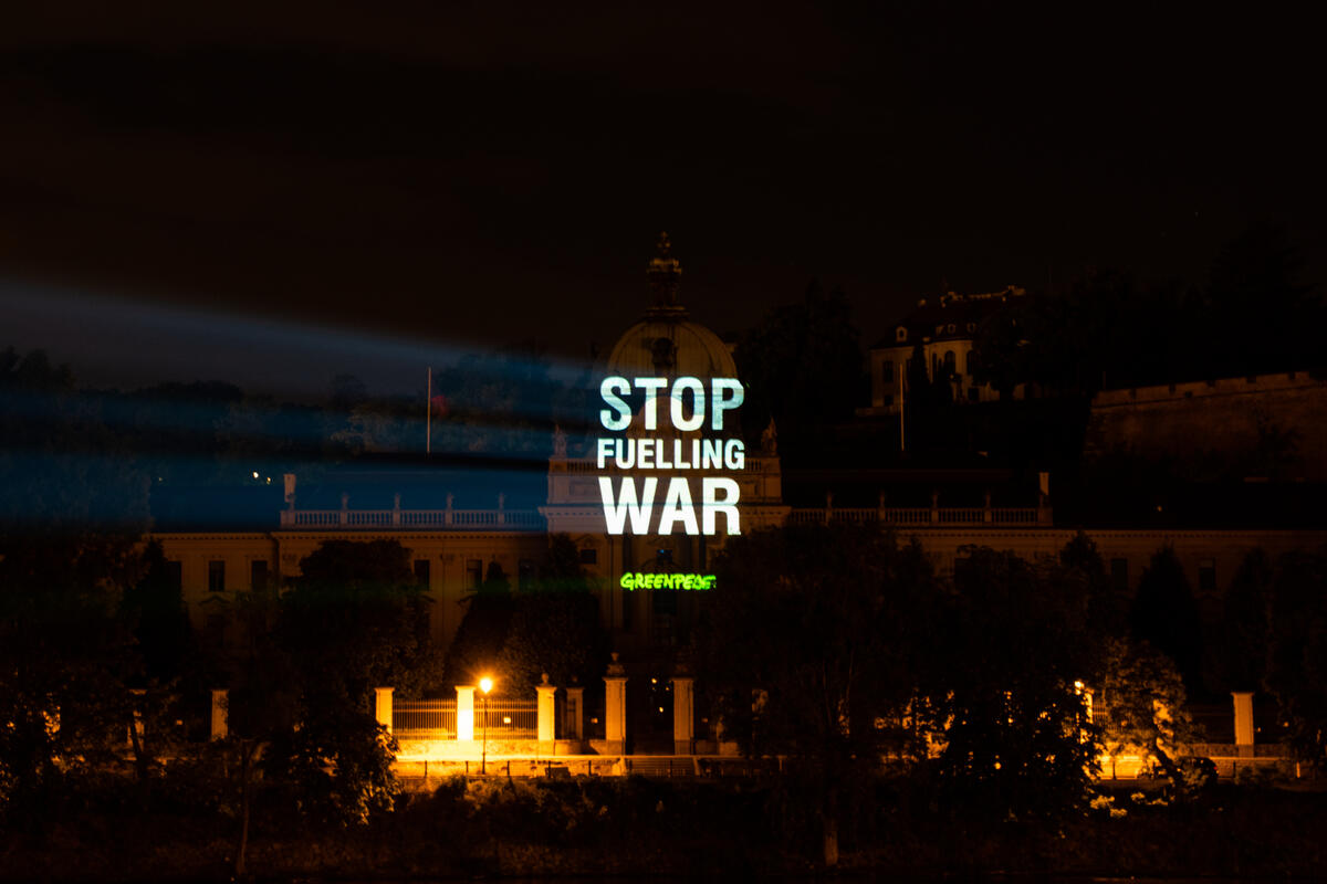 Projection Demanding Russian Oil Ban in Czechia. © Greenpeace / Ray Baseley
