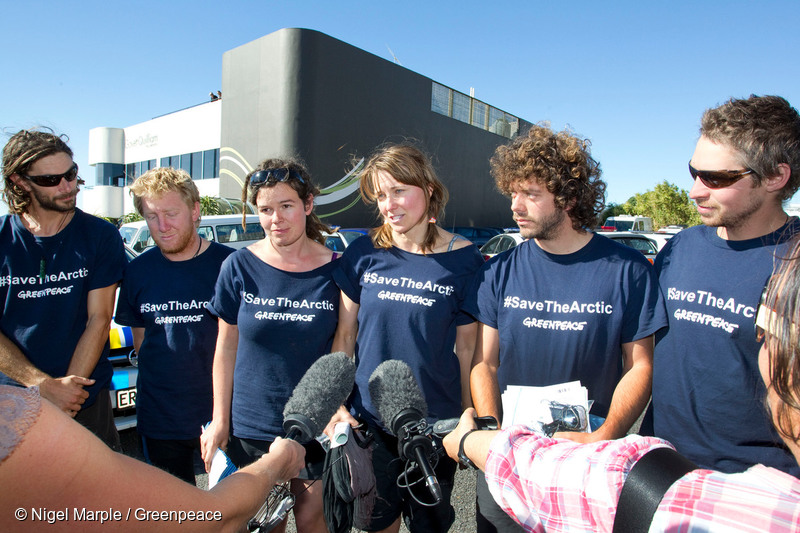 Actor Lucy Lawless, centre, and five Greenpeace activists, from left, Mike Buchanan, Raoni Hammer, Vivienne Hadlow, Shai Naides and Shayne Comino, outside New Plymouth's central police station, after their release on bail on charges relating to their 77-hour occupation of the Noble Discoverer.