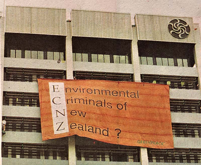 December 1993 Greenpeace activists hang a giant banner that reads ‘Environmental Criminals of New Zealand E.C.N.Z.’ at Electricorp's Wellington head office