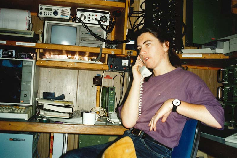 3 December 1990: Greenpeace Nuclear Test Ban Campaigner Stephanie Mills in the radio room on board SV Rainbow Warrior II off Moruroa Atoll. Photo: Steve Morgan