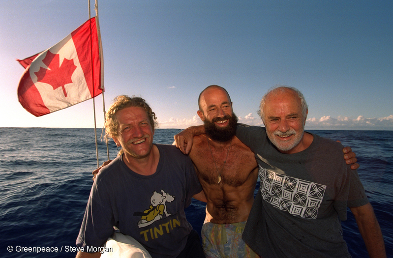 The fifth inflatable crew members Henk Haazen, Chris Robinson, and David McTaggart on board SV Vega off Moruroa