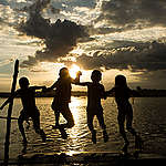 Munduruku Children Swimming in Tapajós River in the Amazon. © Otávio Almeida / Greenpeace