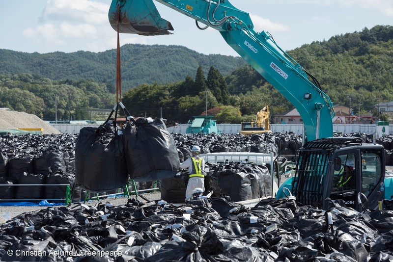 Nuclear waste storage area in Iitate, Fukushima prefecture in Japan. Adopting a return to normal policy, the Japanese government undertook an unprecedented decontamination program for areas of Fukushima contaminated by the tripe reactor meltdown in March 2011. Fukushima prefecture is 70 percent mountainous forest which has not and cannot be decontaminated, with decontamination efforts focused along roads and in towns, farmland and in narrow areas around people’s houses. Even so, the result has been that the Japanese authorities have produced a nuclear waste crisis, with over 13 million cubic meters of waste located in 147,000 locations (as of July 2017). The Japanese government is determined to force people back to their homes despite the on-going radiation risks and the vast volumes of nuclear waste.