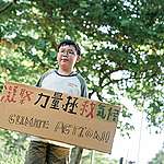 感謝Lance特別手作新的氣候標語。© Patrick Cho / Greenpeace