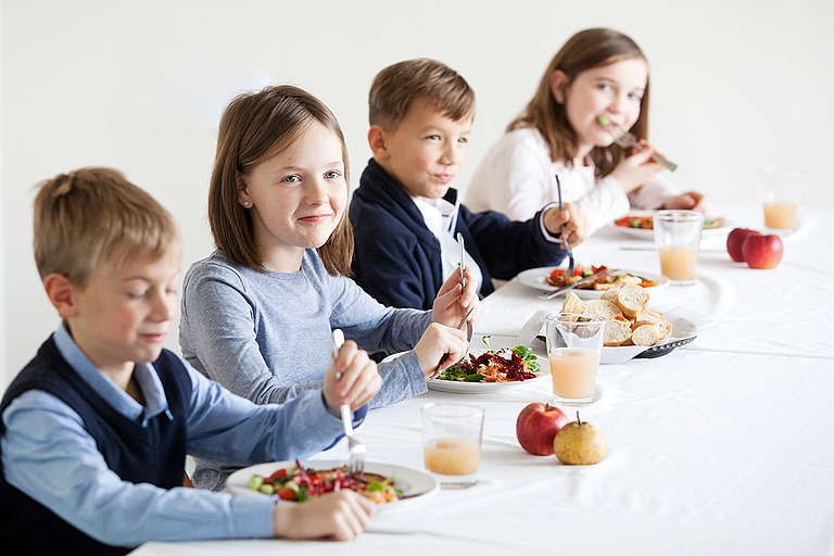Children Eating Ecological Food in a School Canteen in Hungary. © Bence Jardany