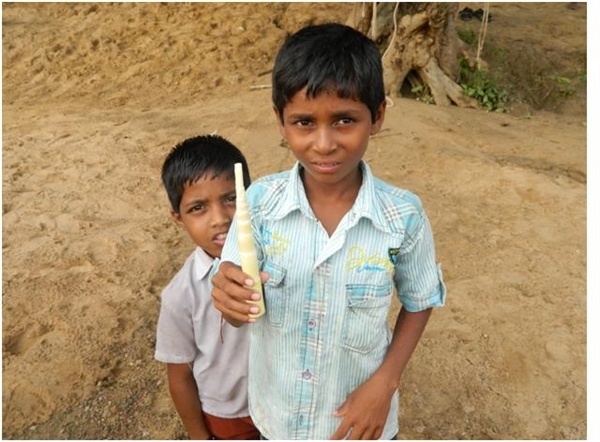 Swapnil with the bamboo shoot