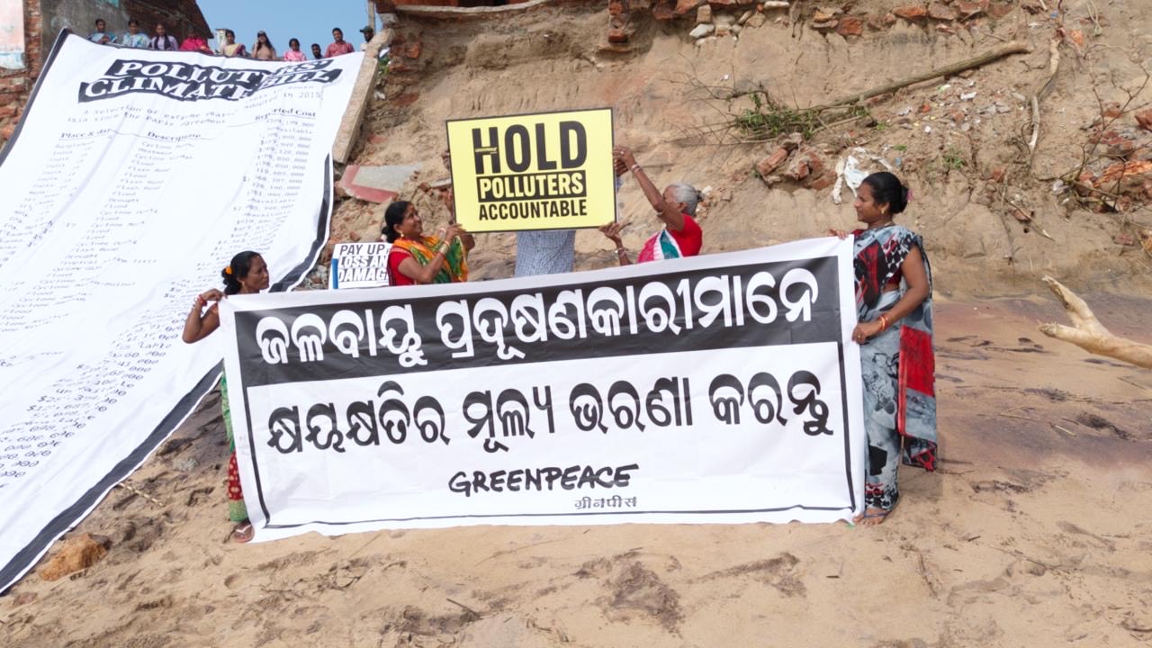 Greenpeace India Unveils Giant ‘Climate Bill’ in Coastal Odisha Demanding Big Polluters Pay