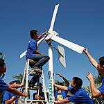 Youth Installing Wind Turbine in Thailand. © Greenpeace / Vinai Dithajohn