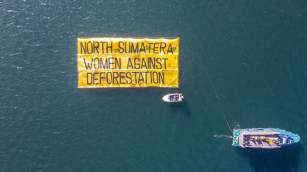 W20 Giant Banner Action in Lake Toba. © Rivan Hanggarai / Greenpeace