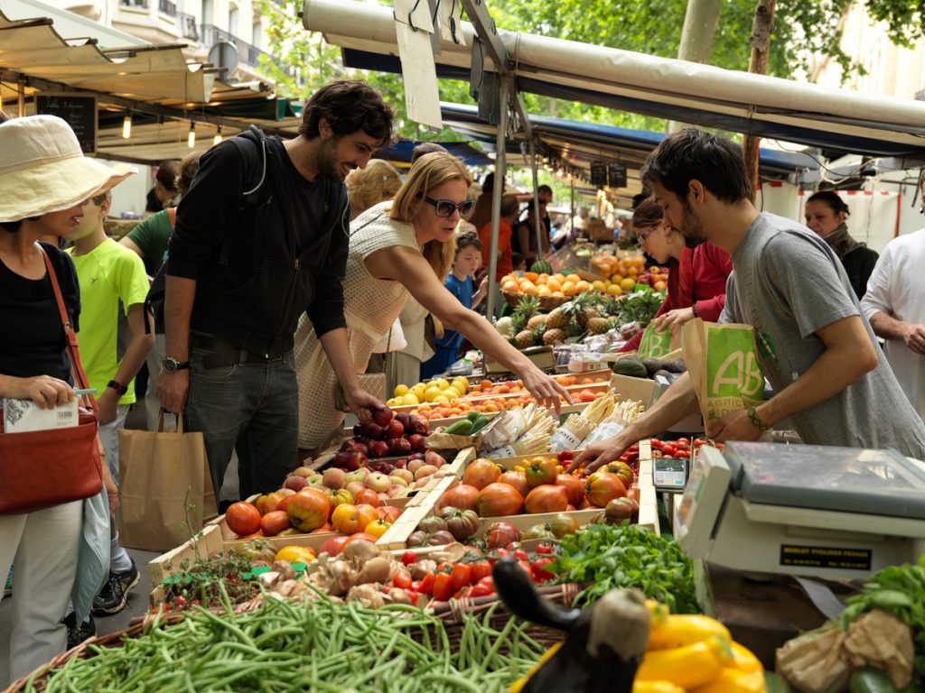 Ecological Produce at Farmers Market in Paris Shopping at Raspail Market in central Paris. It is one of the largest ecological markets in Paris.