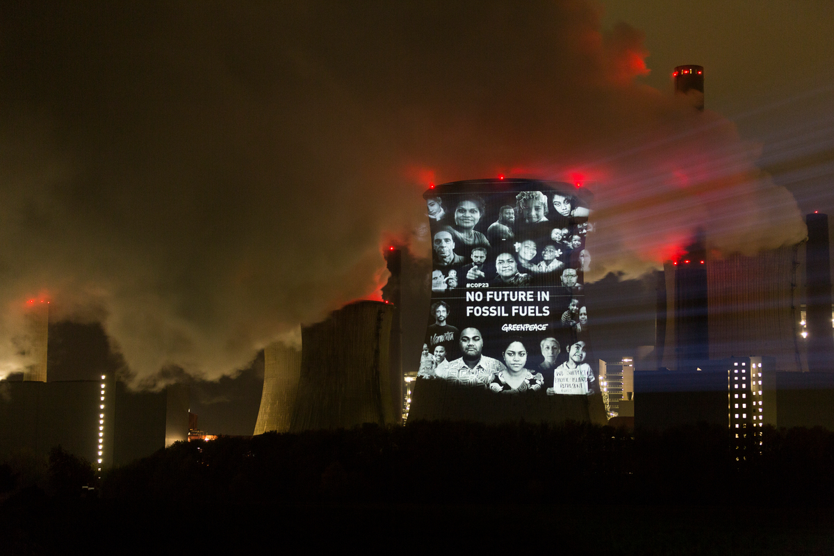 Projection in English onto Coal Power Plant Neurath in Germany © Daniel Müller / Greenpeace