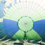 Greenpeace activists inflate a hot air balloon that presents their G20 campaign slogan: Planet Earth First. The balloon drifts over Hamburg as a symbol for civil protests during the G20 summit, to raise awareness on climate and energy as well as social inequality and democracy issues.