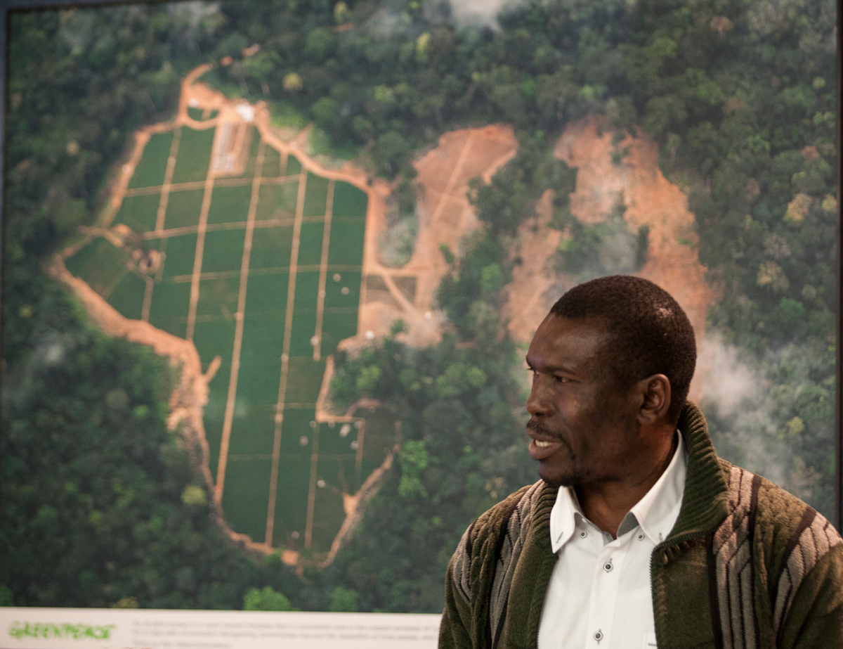 Nasako Besingi, director of the Cameroonian NGO, SEFE, speaks during a press briefing at the National Press Club © Greenpeace / Robert Meyers