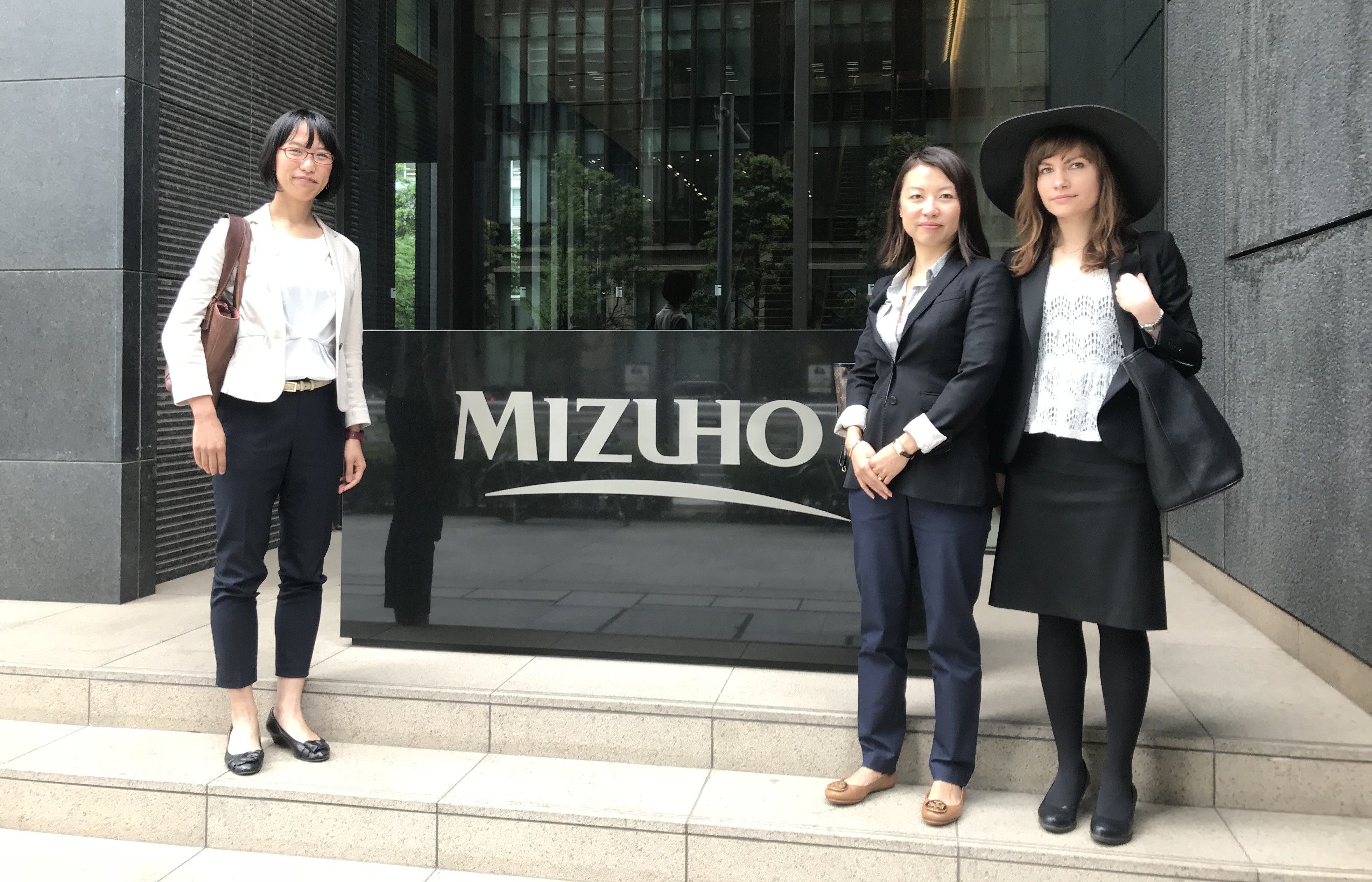 Hisayo Takada, Hanna Hakko Greenpeace Japan) and Marina Lou Greenpeace International) present the Greenpeace briefing: Japanese banks and climate change to Mizuho bank in Tokyo, Japan © Greenpeace 