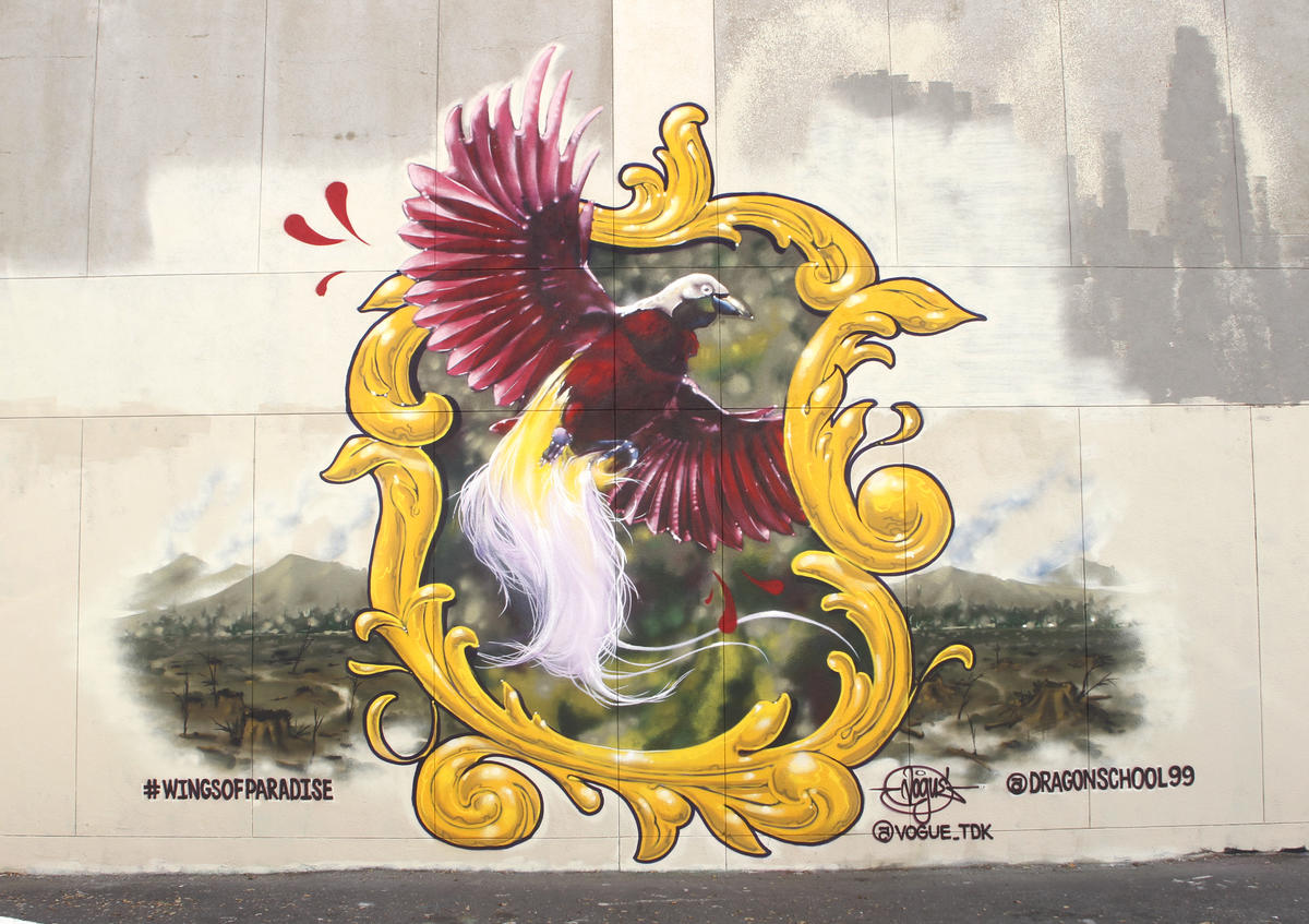 Artist Vogue Paints Wings of Paradise Mural in Oakland, California. © George Nikitin
