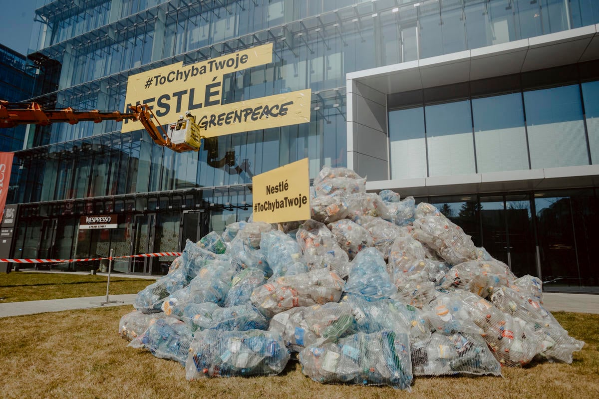 Stop Plastic Action at Nestle HQ in Poland. © Rafal Wojczal / Greenpeace