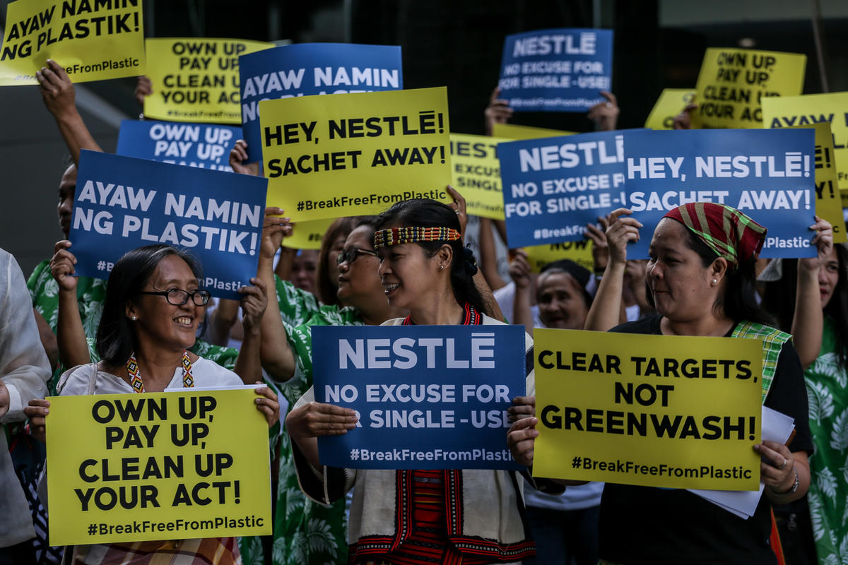 Activists March at Nestle HQ in the Philippines. © Basilio H. Sepe / Greenpeace