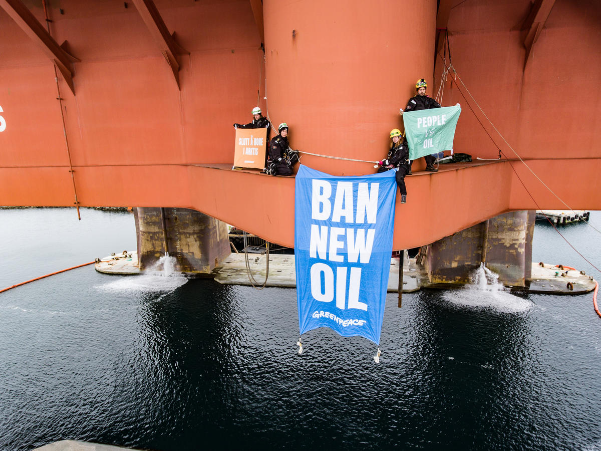 In a peaceful protest Greenpeace activists from Norway, Sweden, Denmark and Germany climb the oil rig West Hercules, located near Rypefjord village in the north of Norway, and display a banner reading "Ban New Oil". While a growing movement calling for real action on climate change is happening all over the world, Equinor's rig is preparing for a season of oil drilling in the Arctic waters of the Barents Sea. © Jani Sipilä / Greenpeace