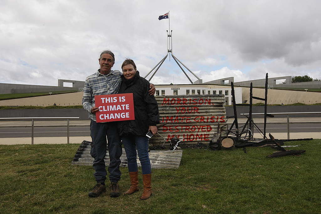 Bushfire survivors Dean Kennedy and Melinda Plesman. Survivors of Australia’s ongoing bushfire emergency deliver the remains of their home to Parliament House in Canberra. Their family home of 35 years, in Nymboida, NSW, was destroyed by bushfires which tore through the town on Friday 8 November. © Dean Sewell / Greenpeace © Dean Sewell / Greenpeace Bushfire survivors Dean Kennedy and Melinda Plesman. Survivors of Australia’s ongoing bushfire emergency deliver the remains of their home to Parliament House in Canberra. Their family home of 35 years, in Nymboida, NSW, was destroyed by bushfires which tore through the town on Friday 8 November. © Dean Sewell / Greenpeace © Dean Sewell / Greenpeace