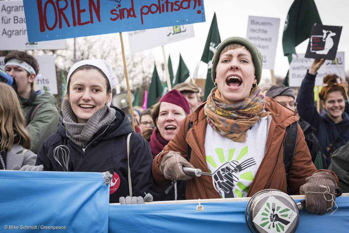 Greenpeace activists taking part to a demonstration against detrimental agriculture policy during the "International Green Week", a trade fair for agriculture in Berlin