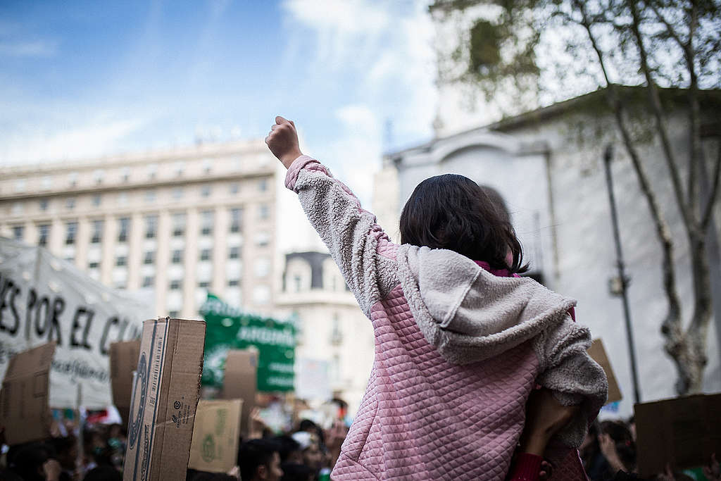 ©Nicolás Villalobos/Greenpeace  Young activist at a climate march in Buenos Aires, Argentina