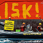 Greenpeace International activists paint the word 'RISK!' on the starboard side of Normand Energy, a vessel chartered by the Belgian company Global Sea Mineral Resources (GSR).  
The Rainbow Warrior is bearing witness to equipment tests carried out by GSR using the Patania II nodule collector, at approximately 4500 metres deep in the Clarion Clipperton Zone. The mining company is aiming to commercially extract minerals from the seabed in the future. 

The Greenpeace ship is in the Clarion Clipperton Zone in the Pacific to bear witness to the deep sea mining industry. Part of the ongoing 'Protect the Oceans' campaign.