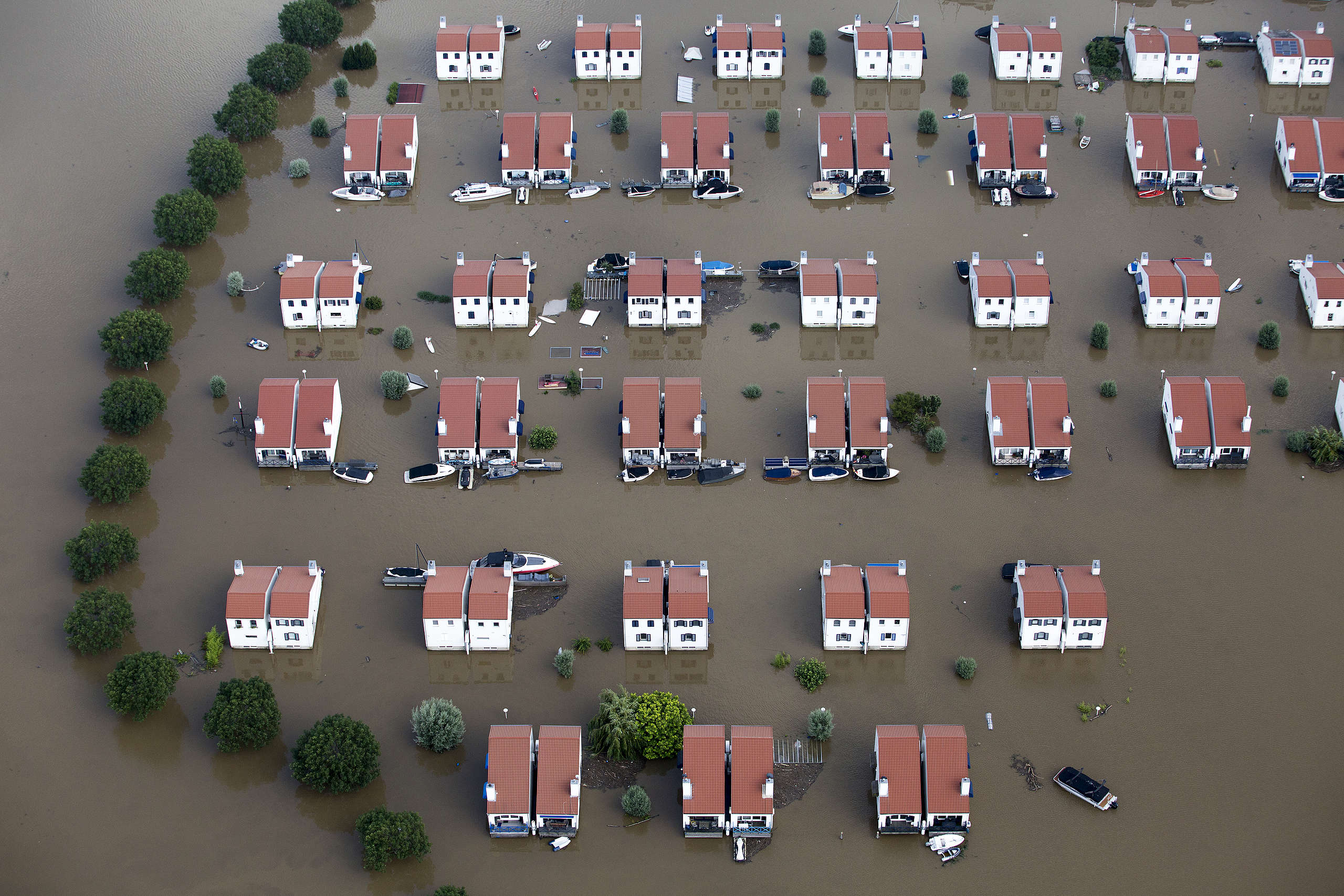 Aerial view along the Maas river in Limburg, Netherlands. © Cris Toala Olivares/Getty Images