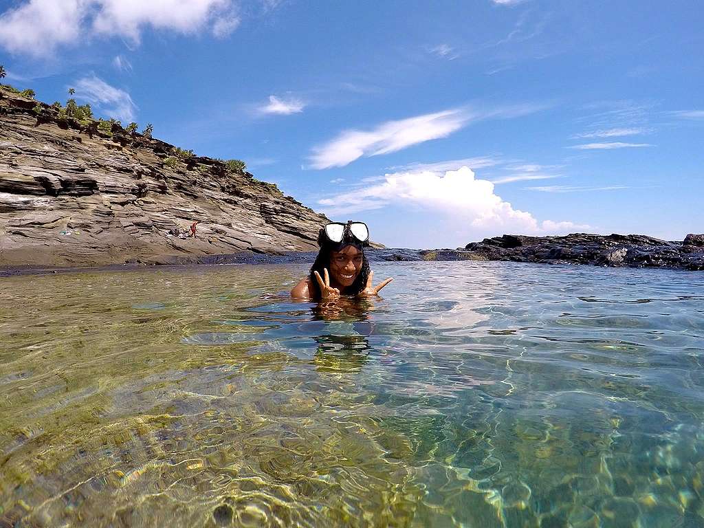 Aurelie explores a natural rock pool ©Aurelie Hector