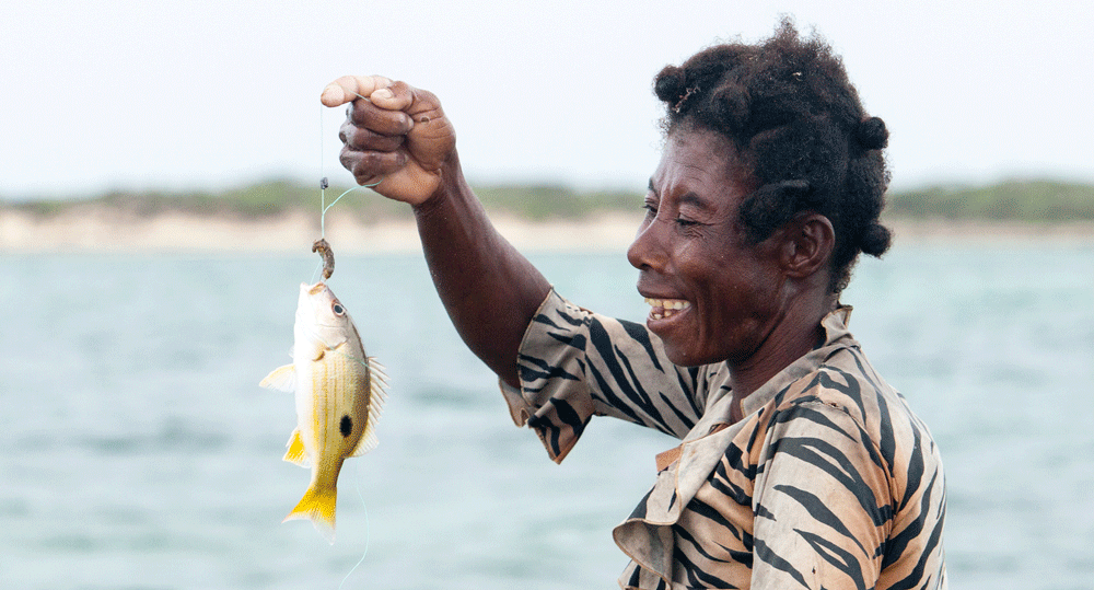 Madame Kokoly and fish © Blue Venture / Garth Cripps