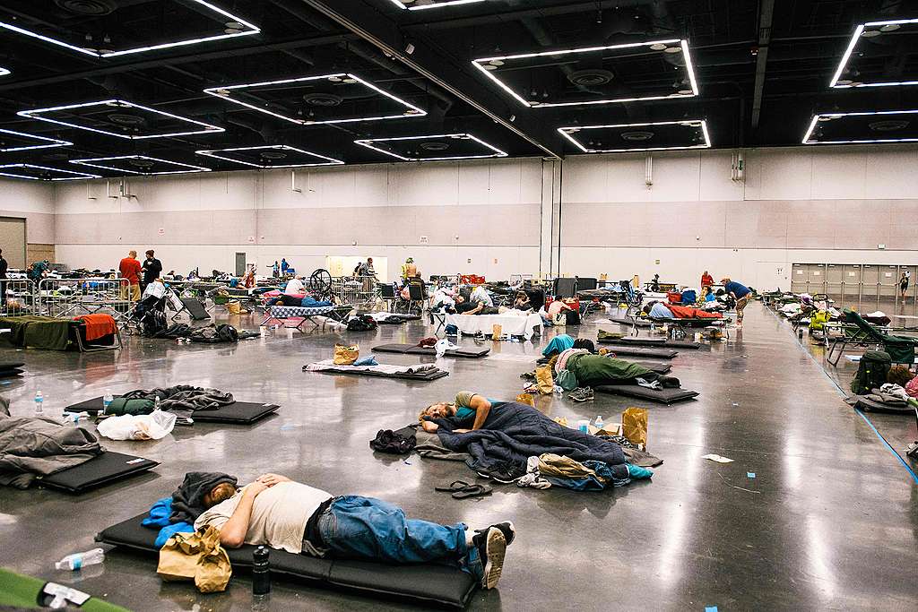 People rest at the Oregon Convention Center cooling station in Portland, Oregon. © Kathryn Elsesser/AFP via Getty Images People rest at the Oregon Convention Center cooling station in Portland, Oregon. © Kathryn Elsesser/AFP via Getty Images