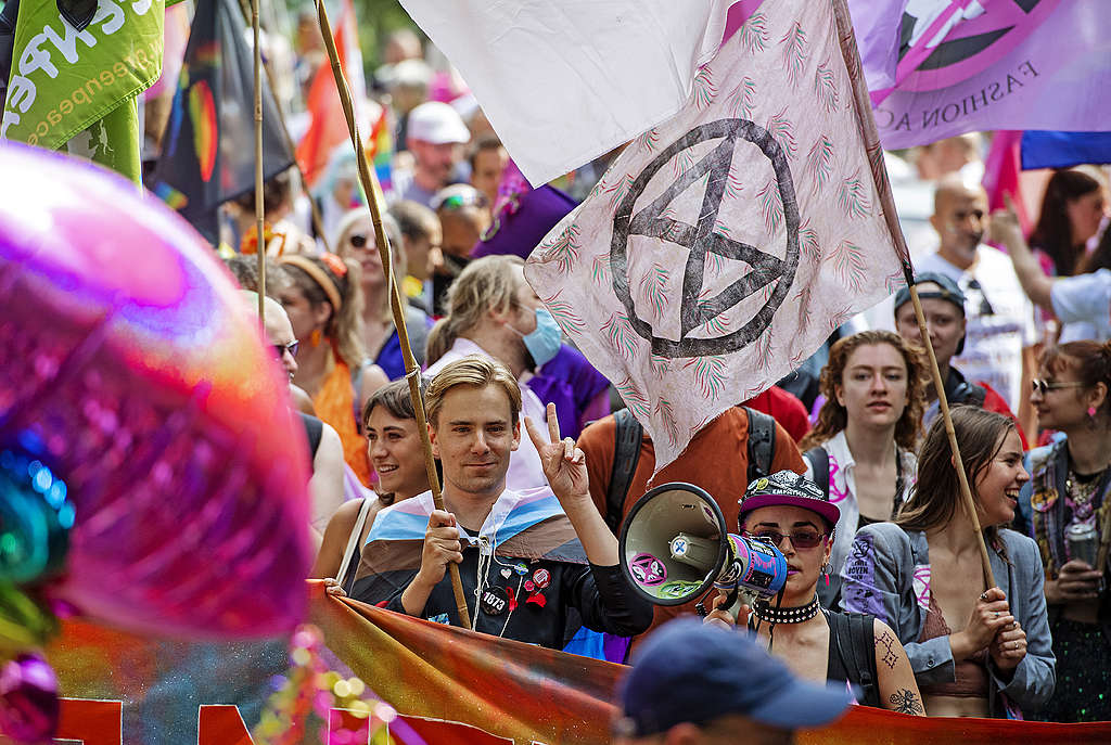 Diederick van den Ende walking with Pride. © Marten van Dijl / Greenpeace Picture showing Diederick van den Ende from Greenpeace Netherlands walking with Pride in Amsterdam