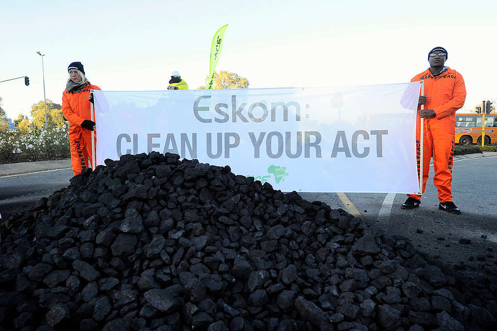 Action at Eskom Megawatt Park in Africa. © Shayne Robinson / Greenpeace Action at Eskom Megawatt Park in Africa. © Shayne Robinson / Greenpeace
