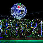 NOT FOR SALE” Banner against Iconic Giant Globe at COP26 In Glasgow. © Emily Macinnes / Greenpeace