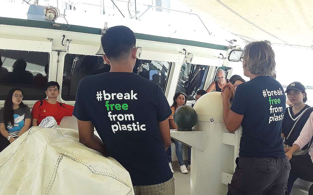 Ronan volunteering as a guide on board the Rainbow Warrior when it was anchored in Tacloban as part of the Climate Justice ship tour.