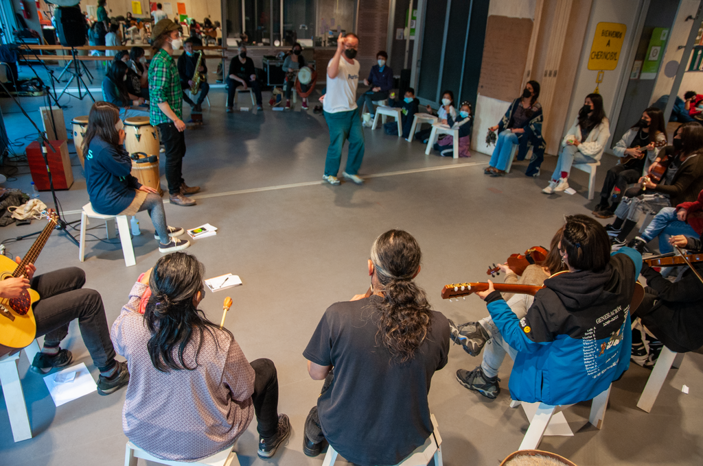 Artists and activist practice a collective musical composition in Chile. © Bruno Giambelluca / Greenpeace © Bruno Giambelluca / Greenpeace