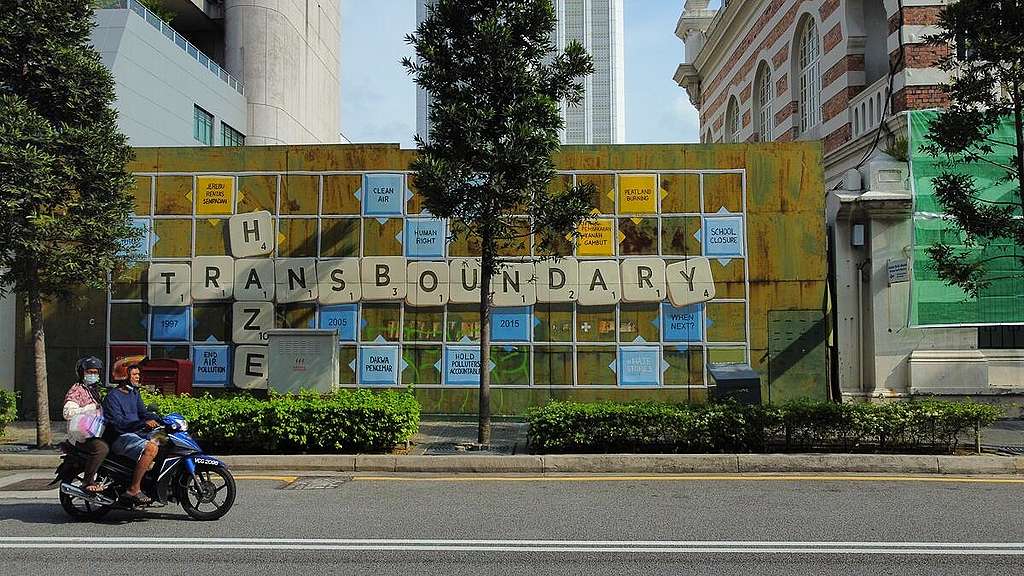 Art Intervention on Transboundary Haze in Malaysia with artist Ernest Zacharevic.