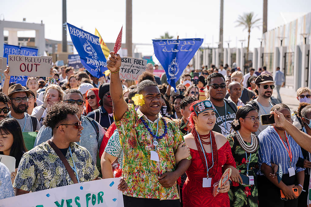 Campaigners demand that polluting companies and countries pay their fair share to repair climate damage