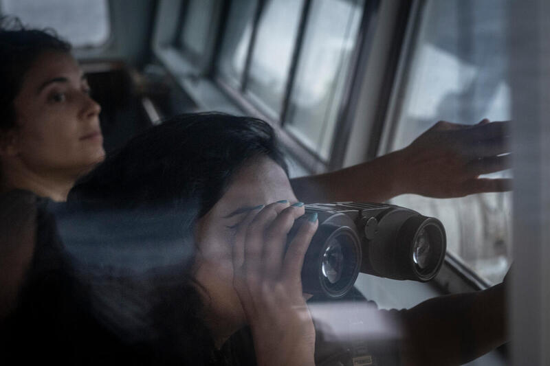 Crew search for longlines from fishing vessels from fishing vessels from the bridge of the Arctic Sunrise in the North Atlantic. © Pedro Armestre / Greenpeace