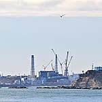 Distant view of the Fukushima Daiichi Nuclear Power Station from Ukedo port. © Ryohei Kataoka / Greenpeace
