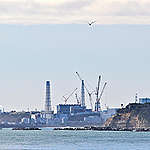 Distant view of the Fukushima Daiichi Nuclear Power Station from Ukedo port. © Ryohei Kataoka / Greenpeace