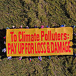In the wake of Super Typhoon Karding, farmers in Tarlac protested, alongside activists from Rice Watch Action Network and Greenpeace Philippines, in a storm damaged farm to call for Loss and Damage finance, a month ahead of COP27, the UN climate talks. Around 20 farmers and advocates held a banner in the middle of a damaged rice field in Brgy Lagumbao with the message: “TO CLIMATE POLLUTERS: PAY UP FOR LOSS & DAMAGE.” The groups are calling on nations who are historic emitters to pay for the political, social, and financial costs of the climate harm they created to heavily impacted nations. The communities expressed this call, along with local demands for a transition to renewable energy and better prices for agricultural products, through placards. As of writing, the Karding’s agricultural damage reached approximately PHP 3.12 billion.