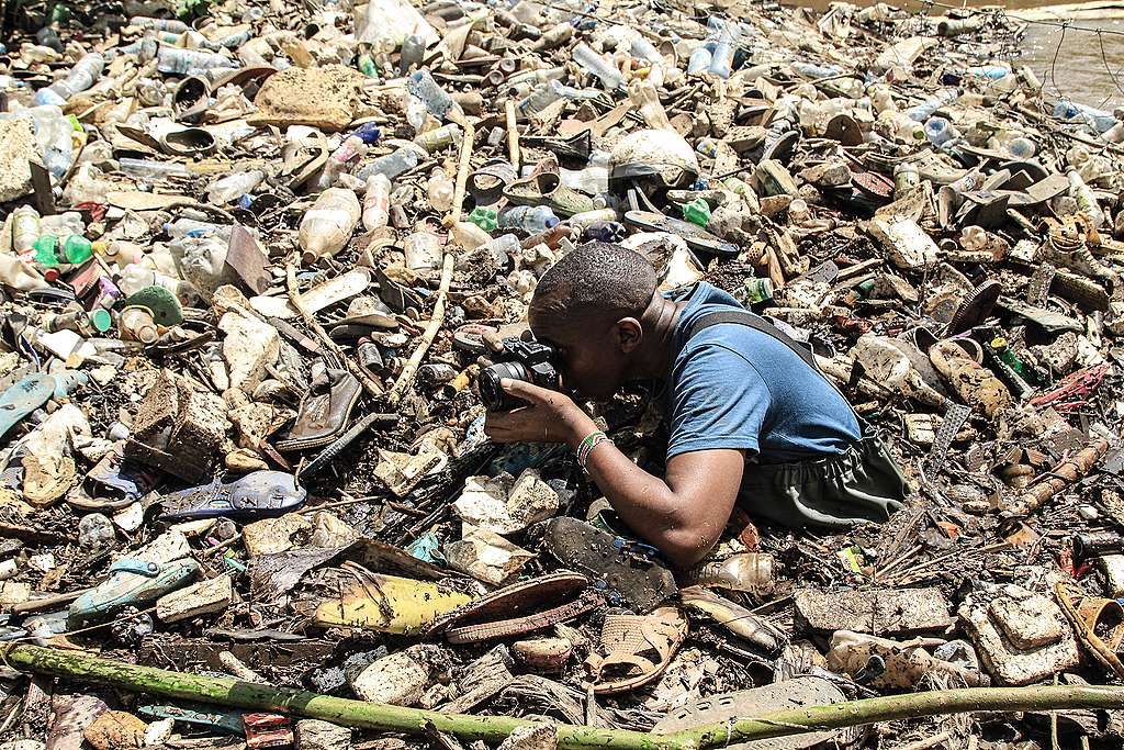 James Kenya James, documenting plastic pollution in Kenya. © Bedan Mwihia