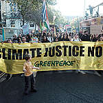 March for Climate Justice in London. © Angela Christofilou / Greenpeace