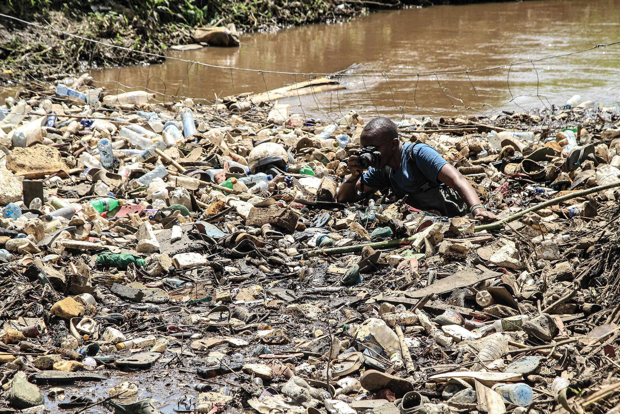 James documenting plastic pollution